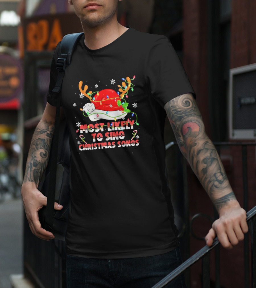 Most Likely To Sing Christmas Songs Santa Hat Reindeer Antlers Lights T-Shirt