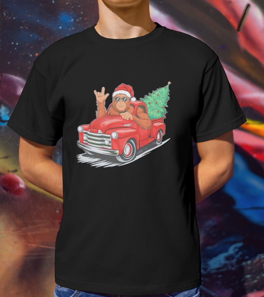 Bigfoot Rock On Santa Hat Christmas Tree Driving Red Truck T-Shirt