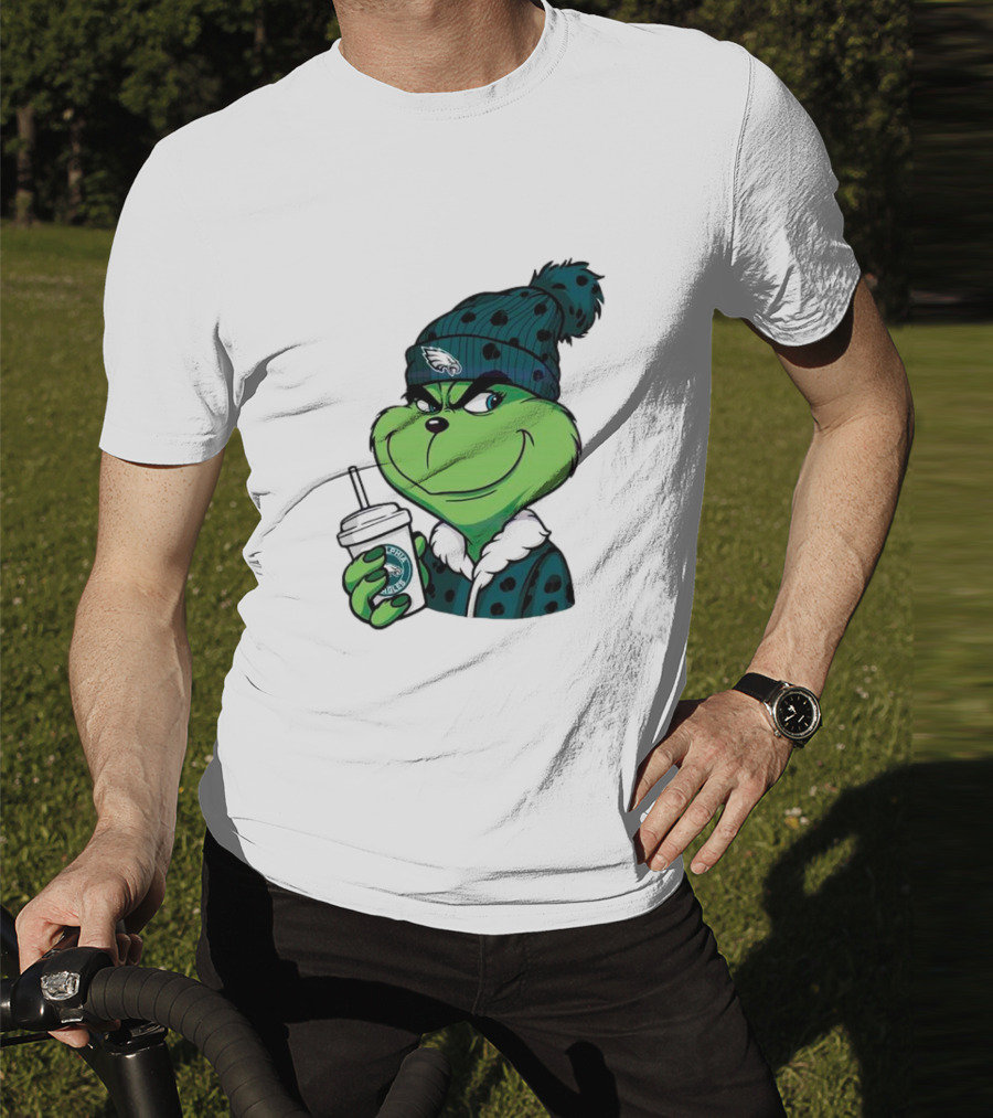 Grinch Holding Cup Wearing Philadelphia Eagles Beanie T-Shirt