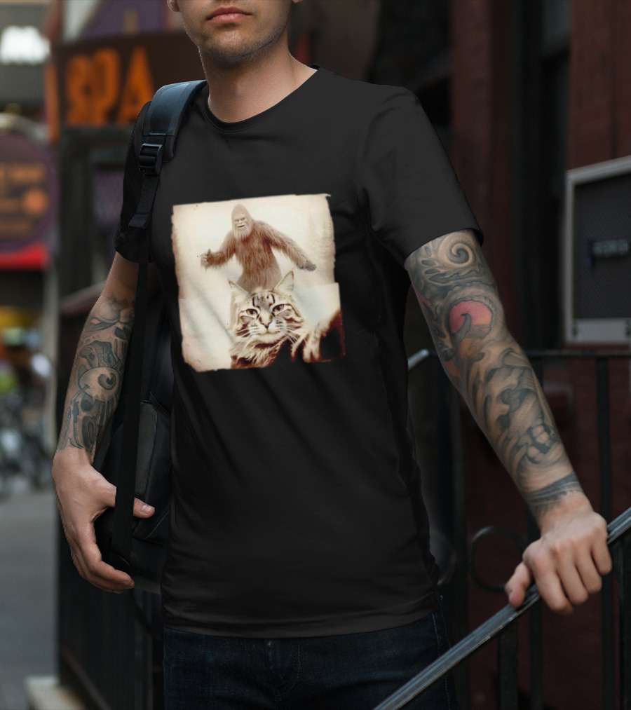 Cat Taking Selfie With Bigfoot In Snowy Forest Scene T-Shirt
