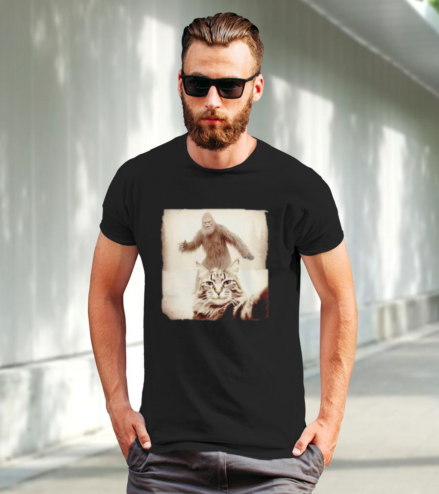 Cat Taking Selfie With Bigfoot In Snowy Forest Scene T-Shirt