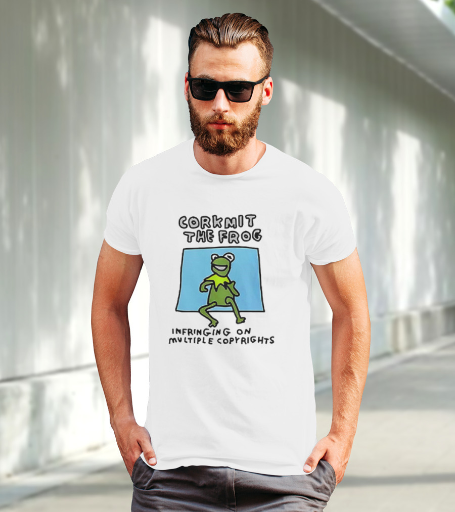 Corkmit The Frog Infringing On Multiple Copyrights Green Frog Cartoon With Blue Background T-Shirt