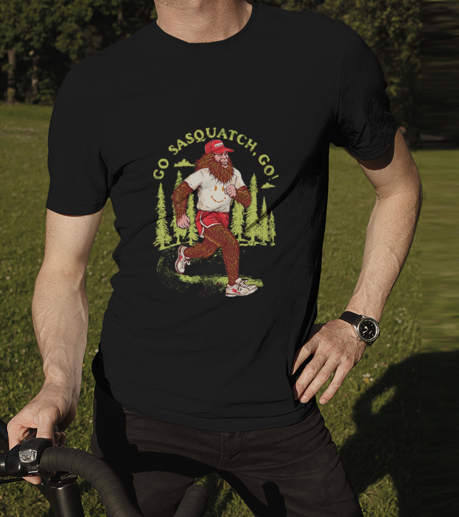 Go Sasquatch Go Bigfoot Jogging In Forest With Red Cap And Sneakers T-Shirt