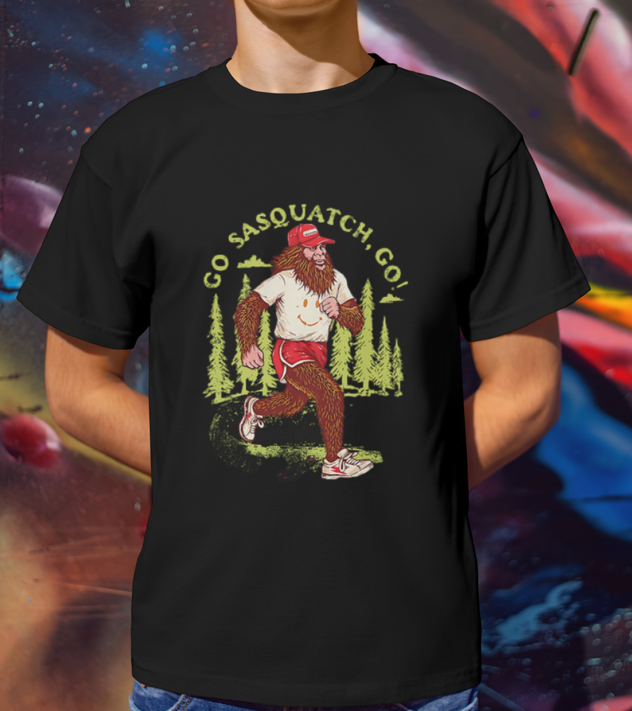 Go Sasquatch Go Bigfoot Jogging In Forest With Red Cap And Sneakers T-Shirt