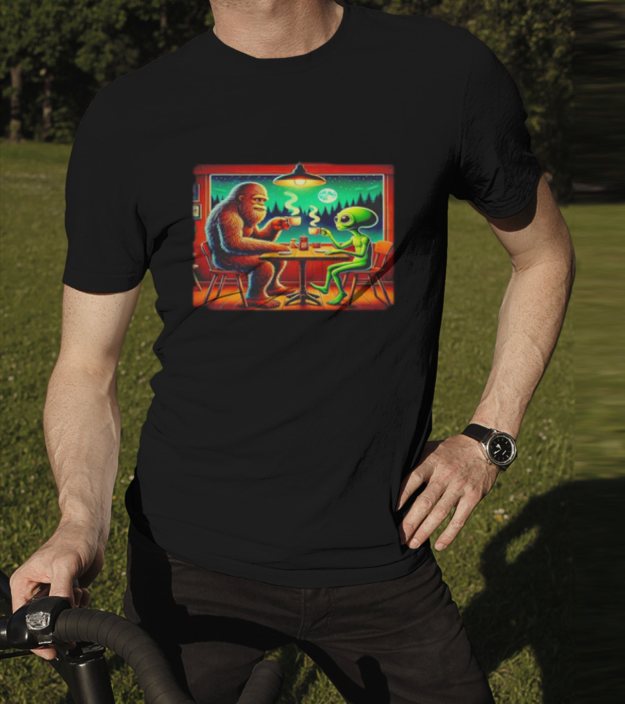 Bigfoot And Alien Coffee Meetup In Cabin At Night With Moonlit Forest T-Shirt