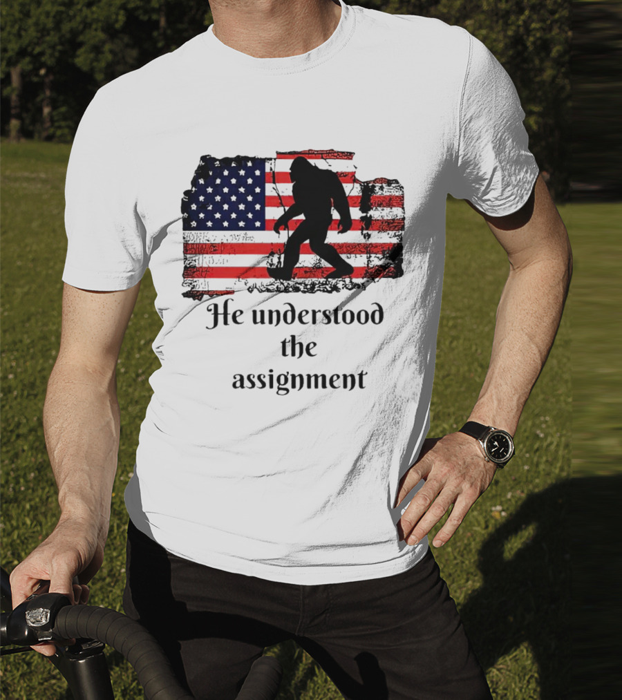 Bigfoot Silhouette With Distressed American Flag He Understood The Assignment T-Shirt