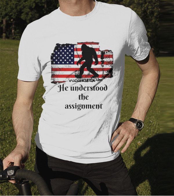 Bigfoot Silhouette With Distressed American Flag He Understood The Assignment T-Shirt