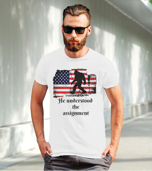 Bigfoot Silhouette With Distressed American Flag He Understood The Assignment T-Shirt