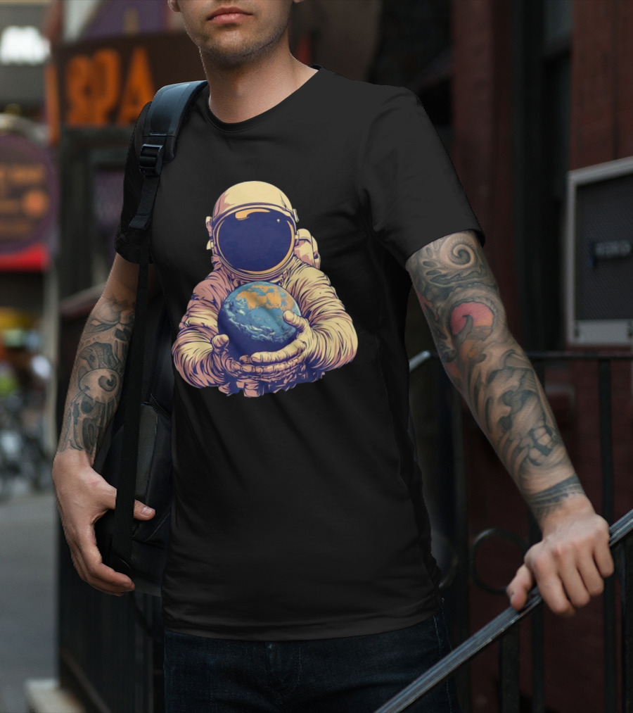 Astronaut Embracing Planet Earth Cosmic Guardians Of Home T-Shirt