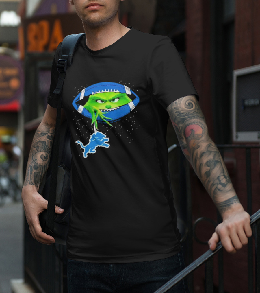 Grinch Holding Detroit Lions Logo Inside Football Christmas T-Shirt