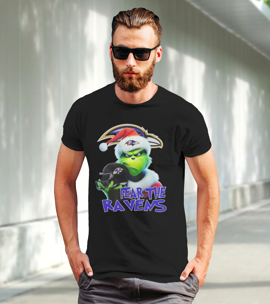 Grinch Wearing Santa Hat Holding Baltimore Ravens Helmet Fear The Ravens T-Shirt