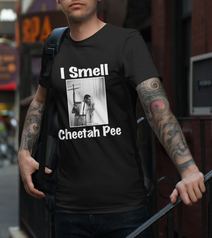 I Smell Cheetah Pee Man Holding Gun By Window T-Shirt