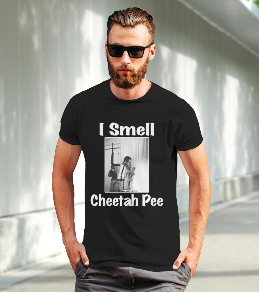 I Smell Cheetah Pee Man Holding Gun By Window T-Shirt
