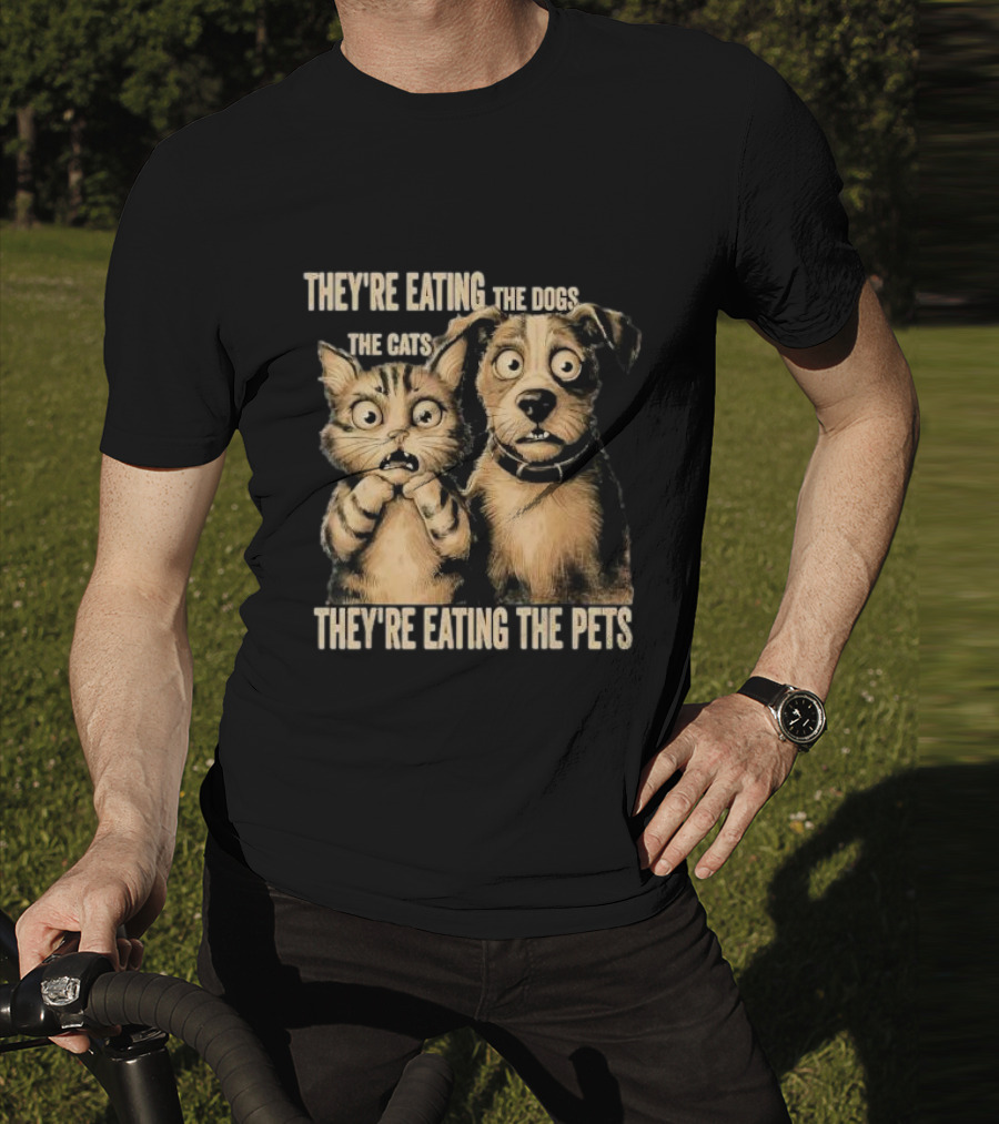 THEY'RE EATING THE DOGS THE CATS THEY'RE EATING THE PETS T-Shirt